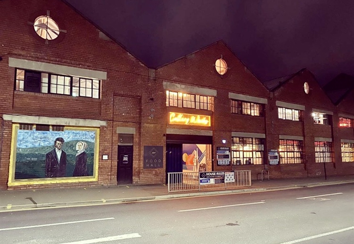 An urban street, at night, in Kelham Island, Sheffield.