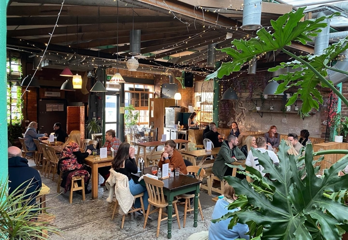 Inside The Old Workshop, filled with customers.