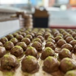 a close of the pistachio and chocolate ball dessert 