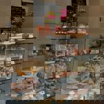 A glass case filled with baked goodies at Eve Kitchen.