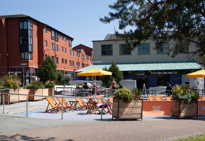 Seating area outside the Forum Kitchen + Bar.