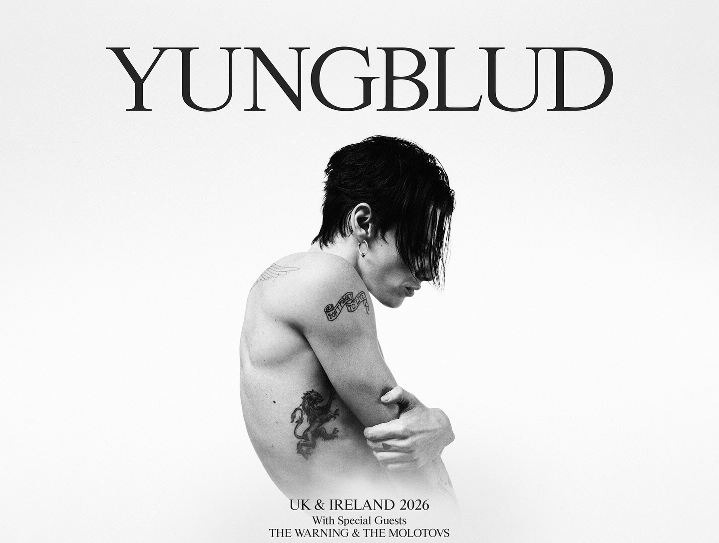 The poster for YUNGBLUD's 2026 tour showing a black and white side profile of the artist 
