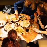 Three people dining at Cornerstone.