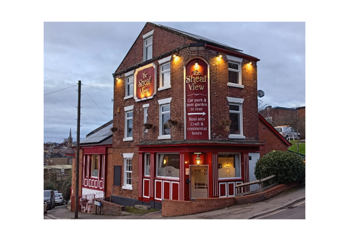 The exterior of the Sheaf View at dusk.