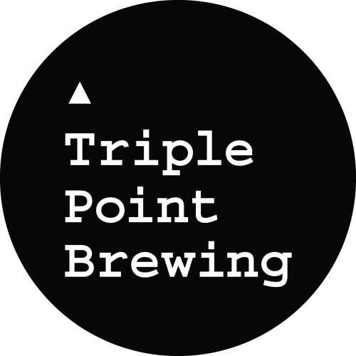 Circular black logo with white text reading ‘Triple Point Brewing’ in a bold, typewriter-style font. A small white triangle appears above the word ‘Triple.’