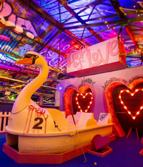 Inside Golf Fang at Sheffield. The décor is bright and cheerful and feels like a fairground.