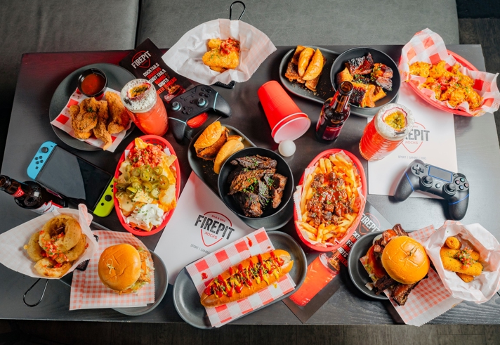 A table full of American style food at FirePit Rocks Bar and BBQ.