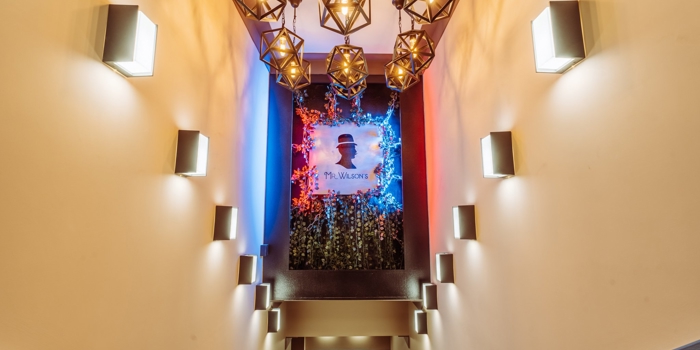 A corridor decorated in 1920s decor.