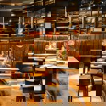 A curved row of tables at Bungalows & Bears.
