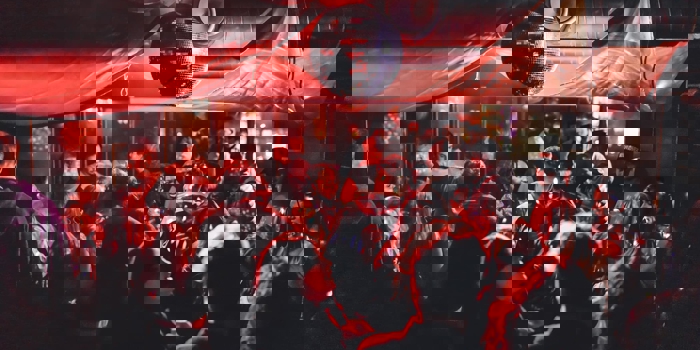 Disco ball above people dancing at Panke Social 