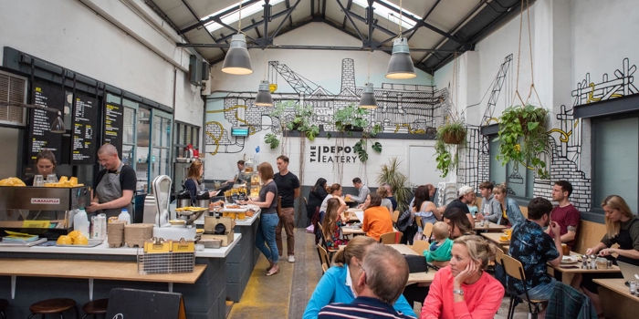 The interior of a busy coffee shop.