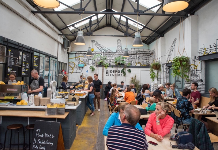 The interior of a busy coffee shop.