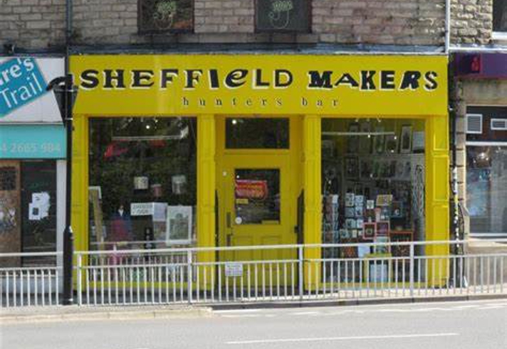 The bright yellow exterior of Sheffield Makers Hunters Bar.