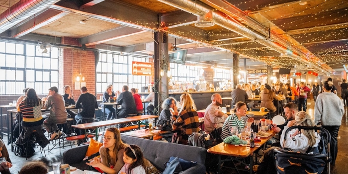 Inside Cutlery Works, filled with customers dining.