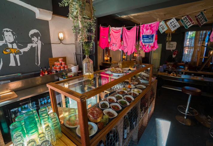 The counter at North Town, with a glass case filled with goods for sale.
