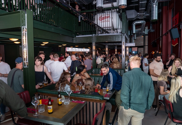 Lots of people socializing at the opening of Kapital Sheffield beer hall 